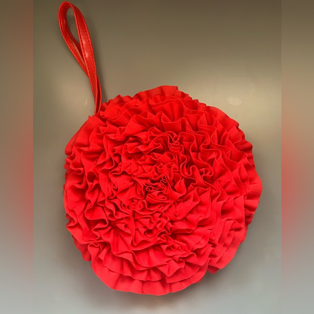 Revlon bag/wristlet perfect for a night out. No visible damages.